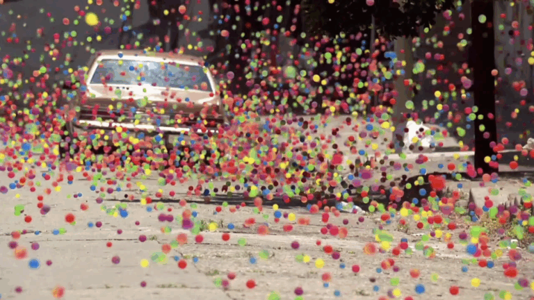 millions of bouncing balls falling down the street in LA